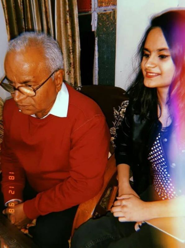 Avani with her grand father