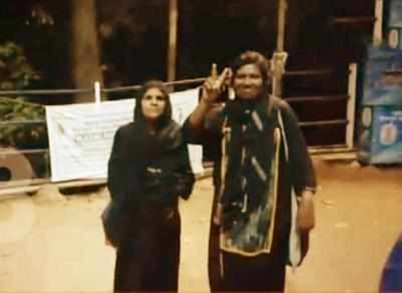 Bindu Ammini and Kanakadurga while showing victory sign after their successful entry into the Sabarimala Ayyappa temple in 2019
