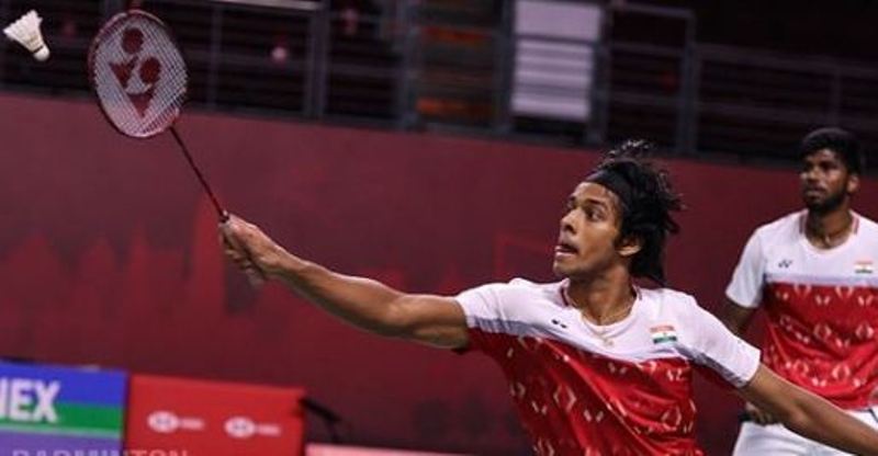 Chirag Shetty using a Voltric 80 E-tune badminton racket during a tournament