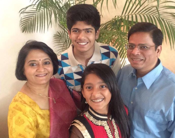 Rakesh Verma with his wife and children