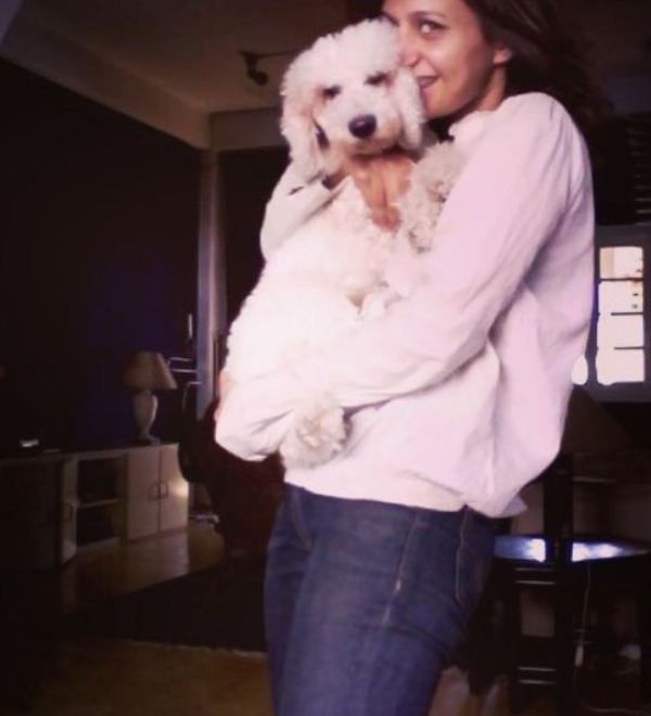Tara Mahmood holding her pet dog