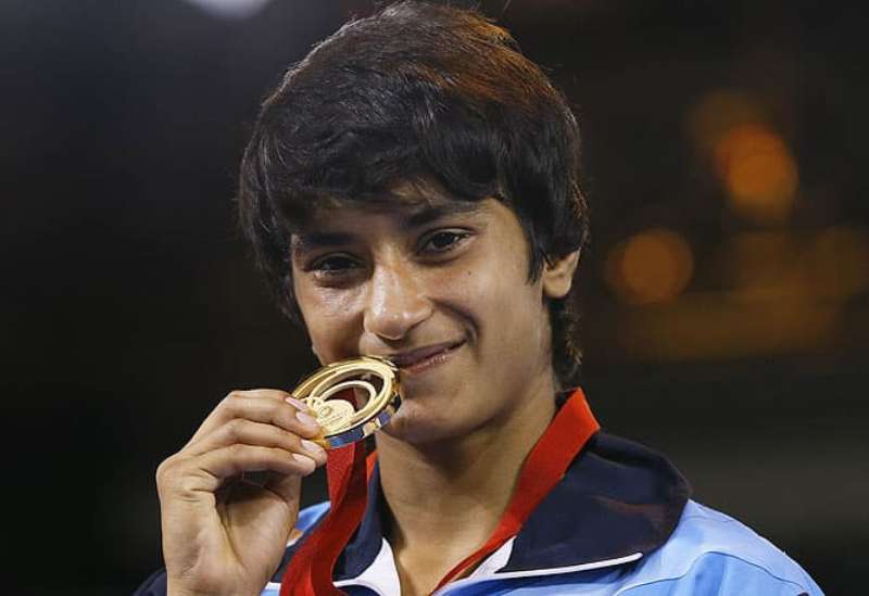 Vinesh Phogat while kissing her gold medal that she won at the 2014 Commonwealth Games in Glasgow