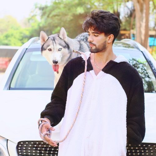 Zeeshan Khan with his pet dog