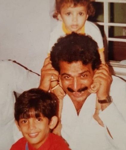 A childhood picture of Arjun Bijlani (in red T-shirt) with his father and brother