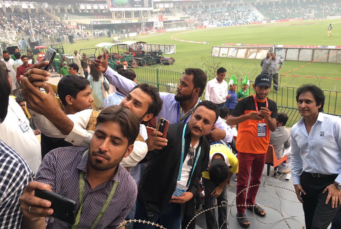 Fans taking a selfie with Ramiz Raja