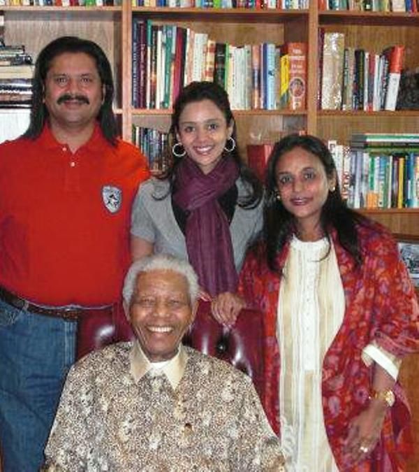 Gayatri Reddy with her parents and Nelson Mandela