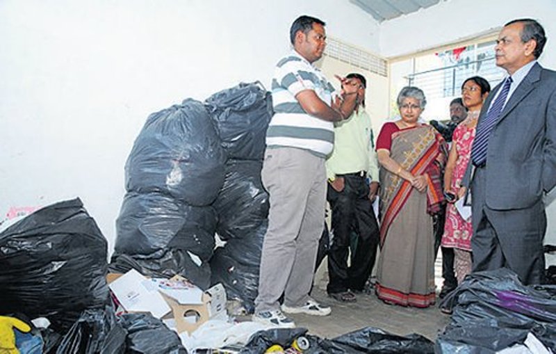 Karnataka High Court judges N Kumar and B V Nagarathna inspecting a dry waste collection centre at Koramangala