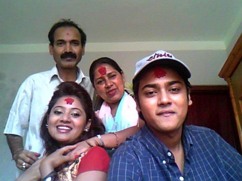 Keki Adhikari with her parents and brother