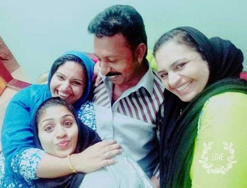 Noorin Shereef with her parents and sister