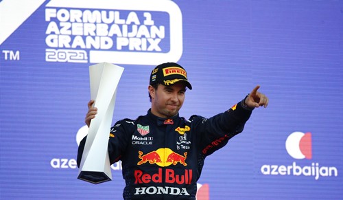 Sergio Perez with the F1 trophy after winning the 2021 Azerbaijan Grand Prix