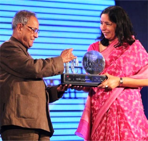 Shika Sharma receiving an award from Pranab Mukherjee