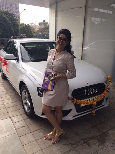Sneha Wagh with her Audi car