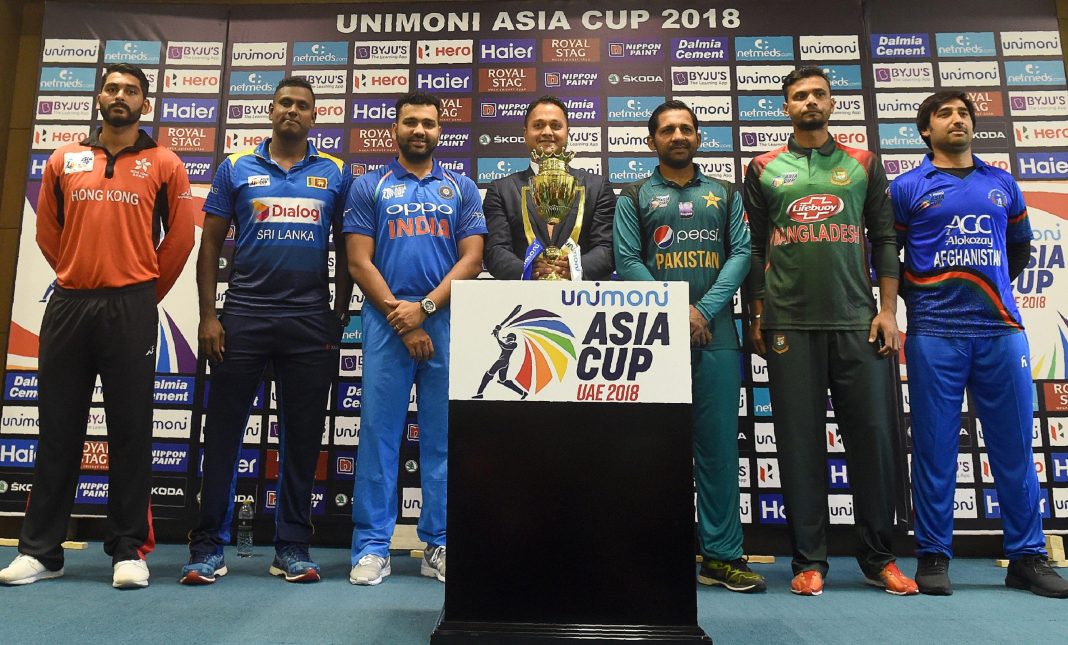 Teams posing with a trophy before the Asia Cup 2018