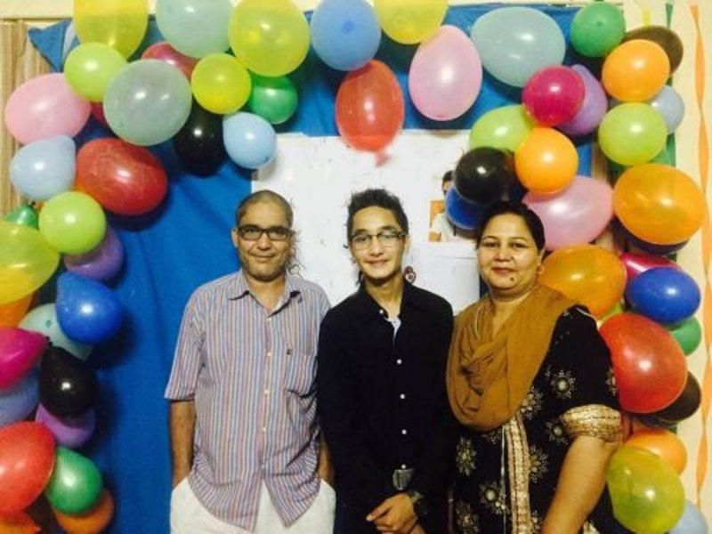 Zuhab Khan with his parents