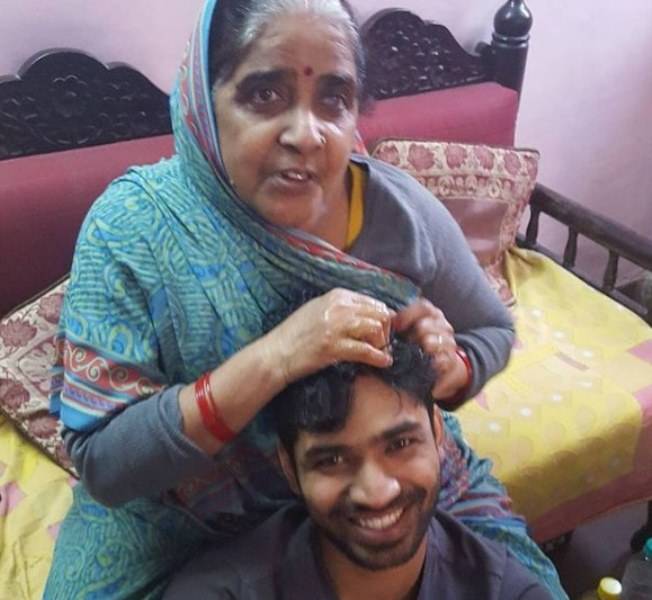 Anupam Tripathi with his mother