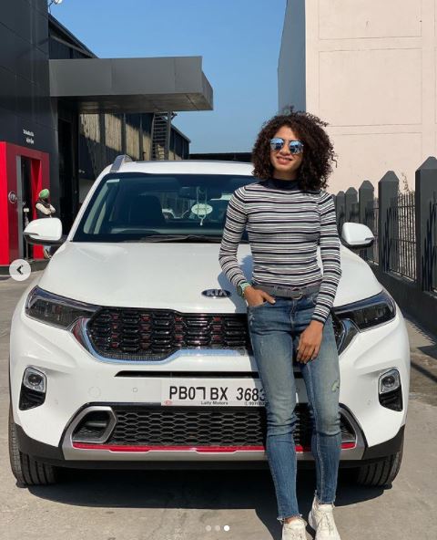 Harmilan Kaur with her car: Kia Sonet