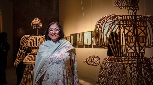 Kiran Nadar with a sculpture at her art museum in Delhi