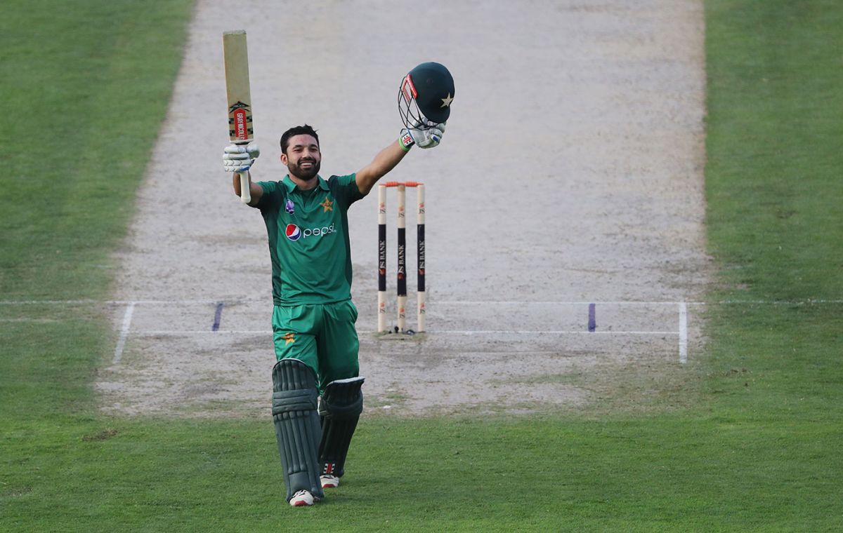 Mohammad Rizwan raising his bat after scoring a century