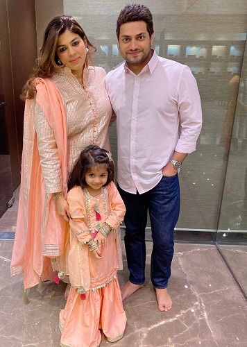 Pooja Dadlani with her husband and daughter