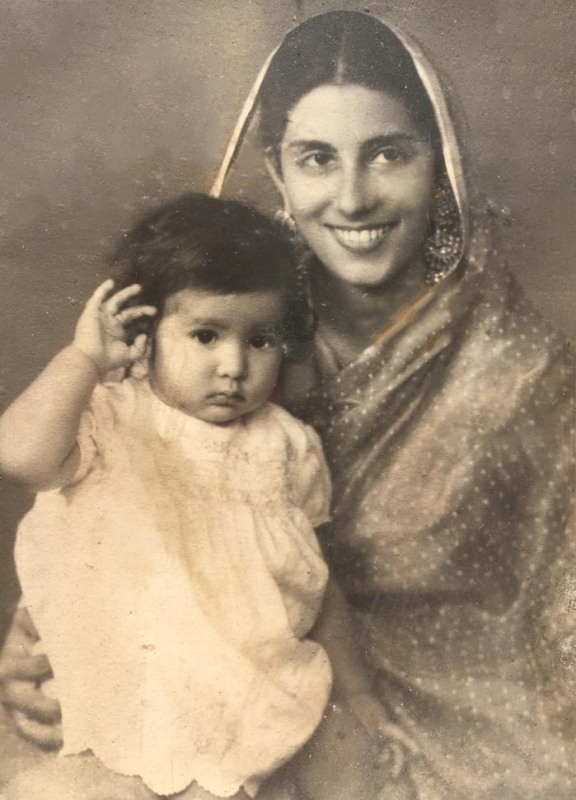Preneet as a child with her mother