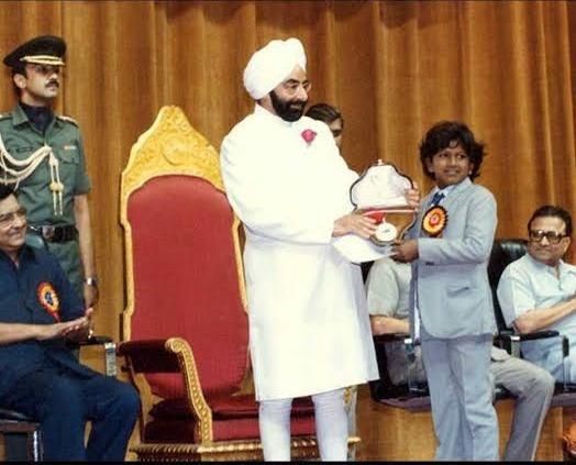 Puneeth Rajkumar being awarded with the National Film Award for Best Child Artist