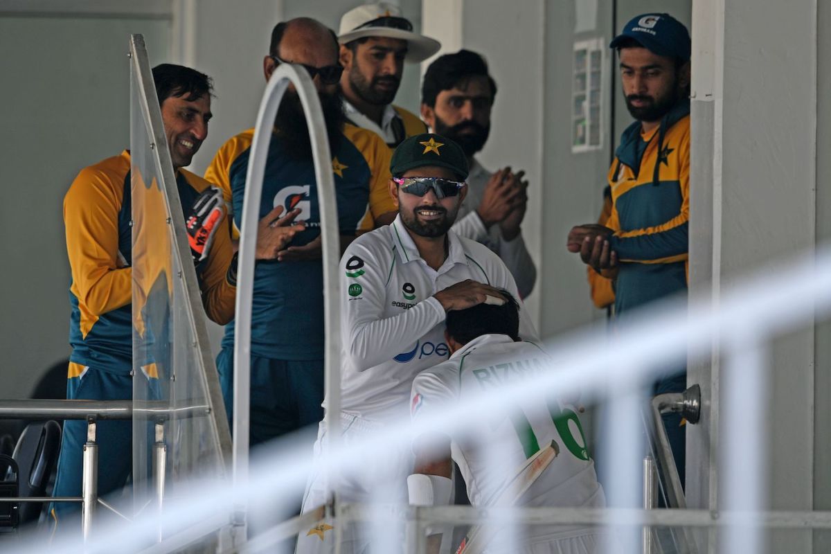 Rizwan congratulated by his team members after reaching the dressing room