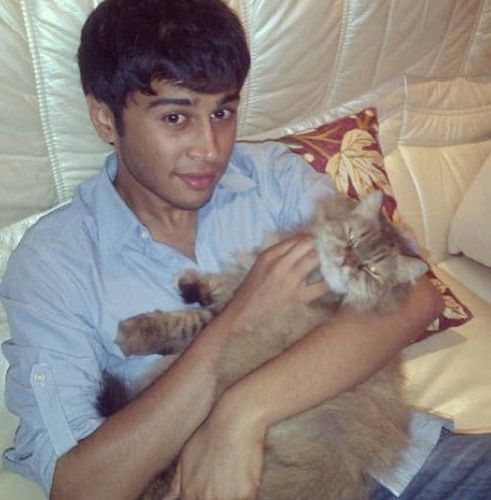 Sharic Sequeira with his pet cat