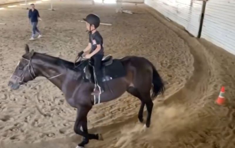 Shinda Grewal while riding a horse