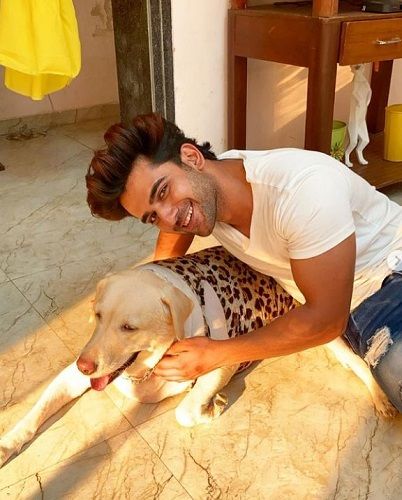 Suraj Sonik with his pet dog
