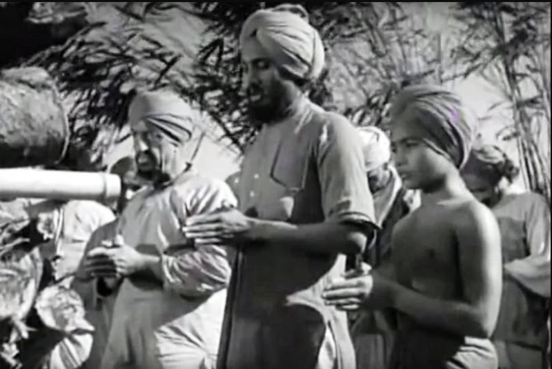 Udham Singh (centre) in a scene from Elephant Boy