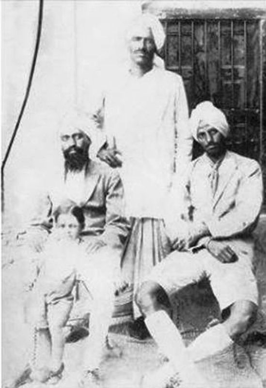 Udham Singh (standing) with his friends