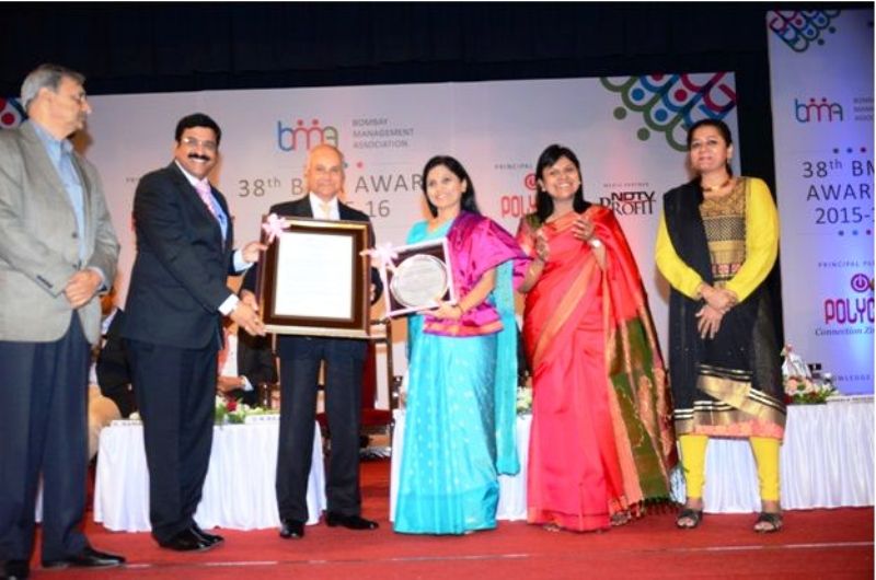 Usha Sangwan receiving the BMA Management Woman Achiever of the Year Award