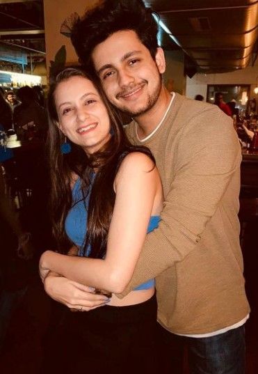 Adish with his girlfriend