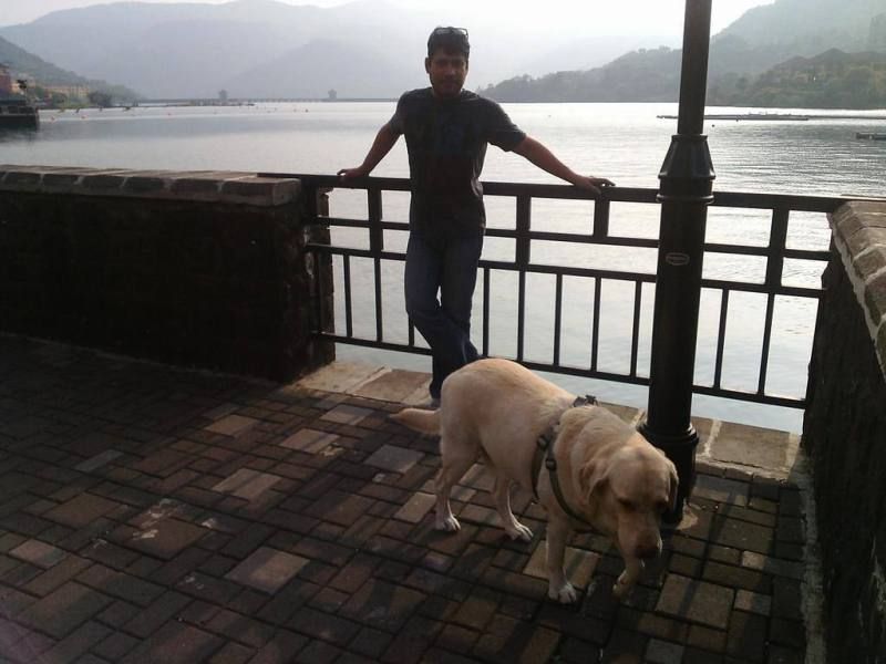 Aditya with a dog