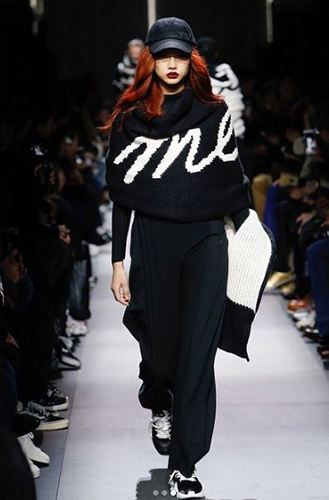 Jung Ho-yeon walking the ramp for Adidas in her fiery red hair color