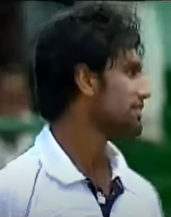 Munaf Patel watching the ball goes towards boundary by Ramnaresh Sarwan in 2006