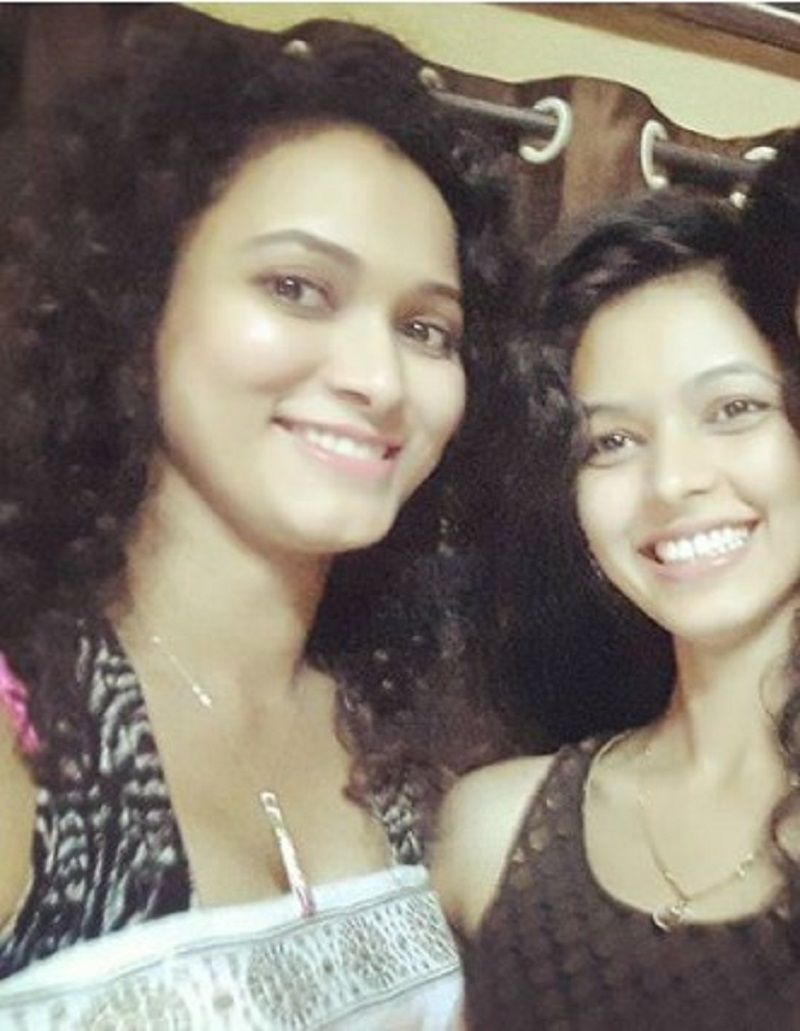 Neetha with her sister Nidhi