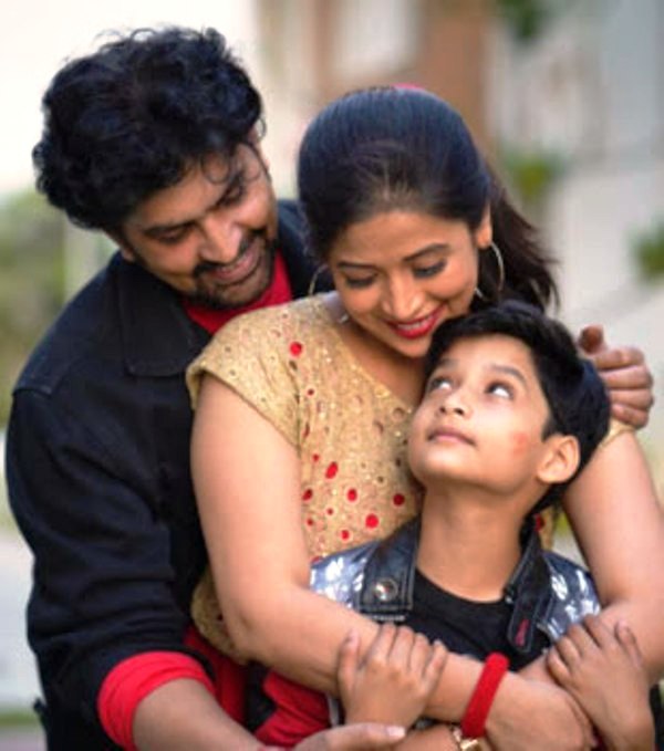 Ravi Kiran with his son and wife
