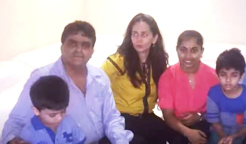 Riyaz Bhati with his wife, two sons, and gymnast Dipa Karmakar