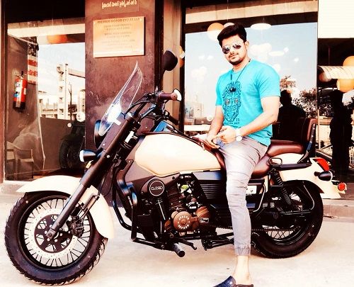VJ Sunny posing on his motorcycle