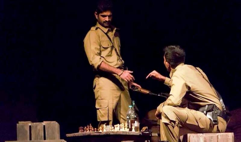 R Badree (left) in a theatre play in 2015
