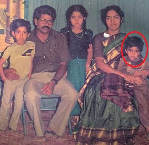 A childhood picture of Joseph Radhik with his parents and siblings