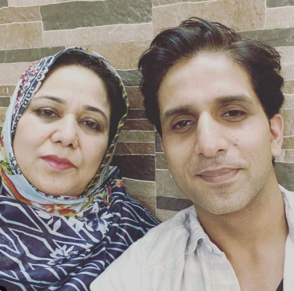 Arslan Goni with his mother