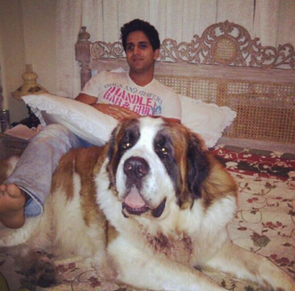 Arslan Goni with his pet dog