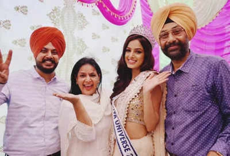 Harnaaz Sandhu with her parents and brother