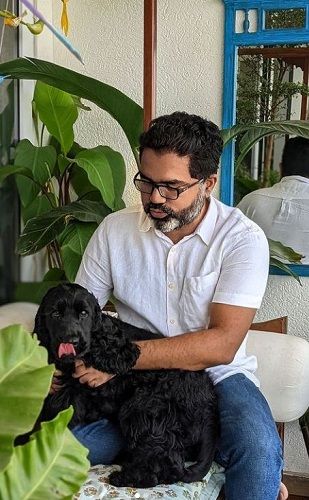 Joseph Radhik with his pet dog