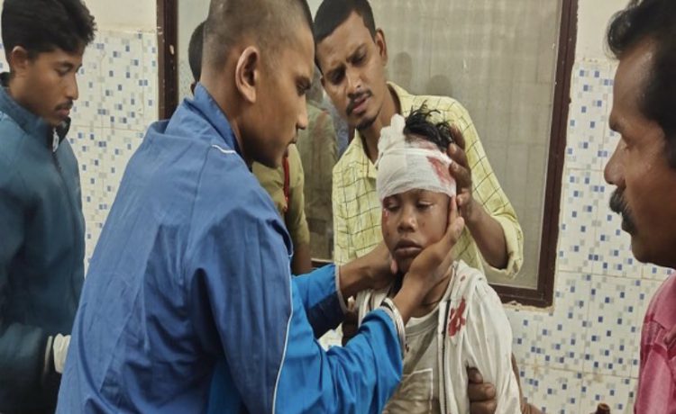 Sahdev Dirdo being treated in a hospital