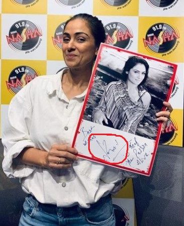 Simran`s signature while attending a radio show