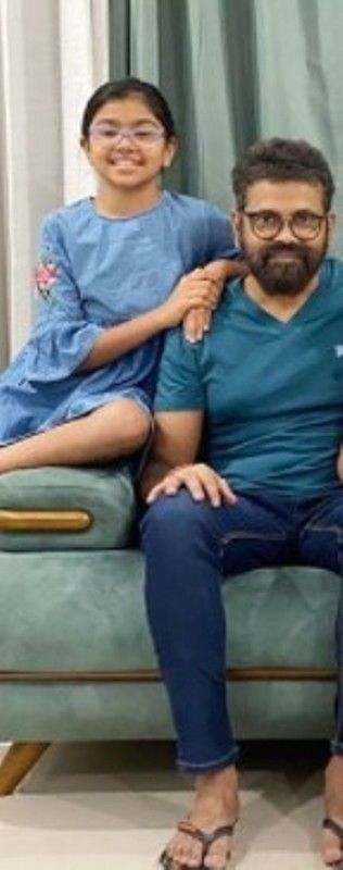 Sukumar with his daughter