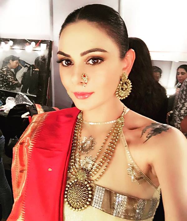 A picture of model Aanchal Kumar featuring her shoulder tattoo